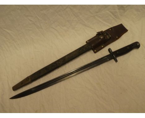 A 1907 pattern Lee Enfield bayonet in steel mounted leather scabbard with leather frog