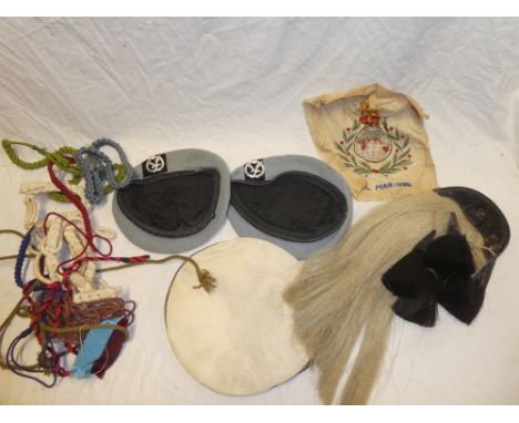 Two Army Air Corps pale blue berets with anodised badges; leather mounted military sporran and a selection of lanyards, etc