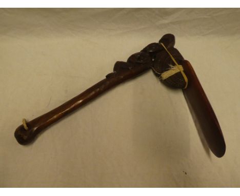 A 20th century Maori carved wood adze-style club 18½" long