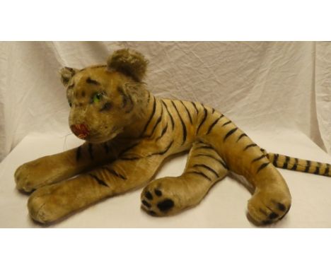 A large plush covered straw filled tiger figure by Steiff 29" long