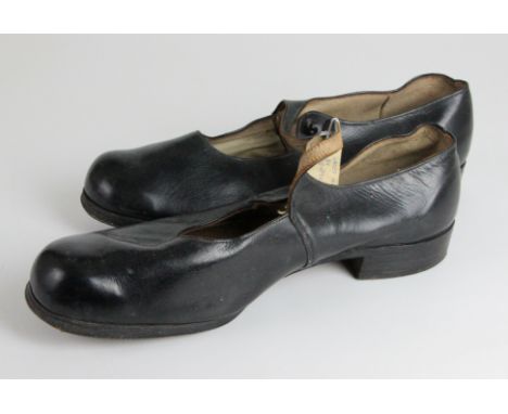 Wormley workhouse, Hambledon, Surrey ladies shoes, c1937, black leather with strap and button, 29cm max (2)