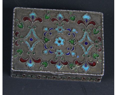 A Russian white metal and cloisonné enamel box, rectangular, the cover with a design of floret garlands and foliate edged scr