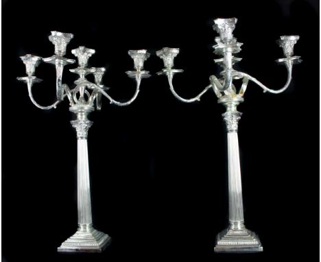 A pair of large silver plated five light Corinthian column candelabra, modern, 70cm high (2)