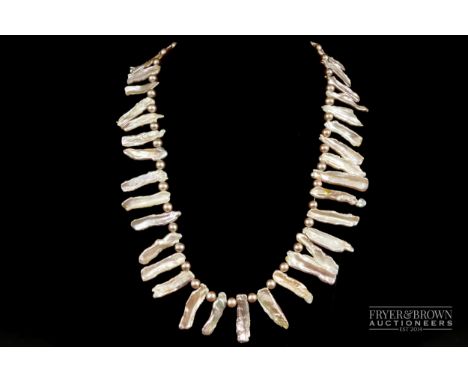 A Mississippi style freshwater pearl and cultured pearl fringe necklace, approximately 45cm long 