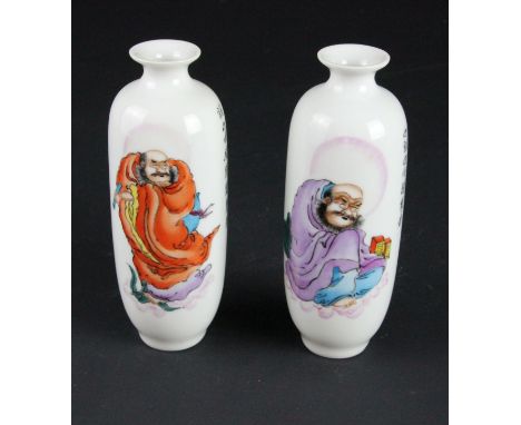 A pair of Chinese vases, of tapered cylindrical form, decorated with a seated immortal with basket and seals; the other with 