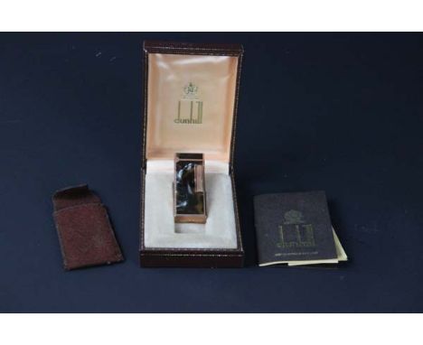 A Dunhill Rollagas Gemline tortoishell and rose gold lighter and original box, with paperwork