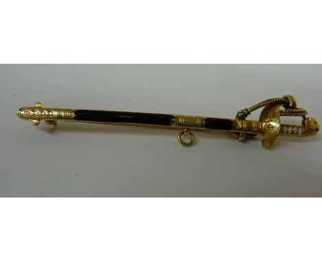 An antique 15ct gold and enamel bar brooch, c1900, in the form of a miniature naval officers sword