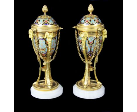 Attributed to Ferdinand Barbedienne (1810-1892), a fine quality pair of ormulu and champlevé enamel cassoliettes of neo-class
