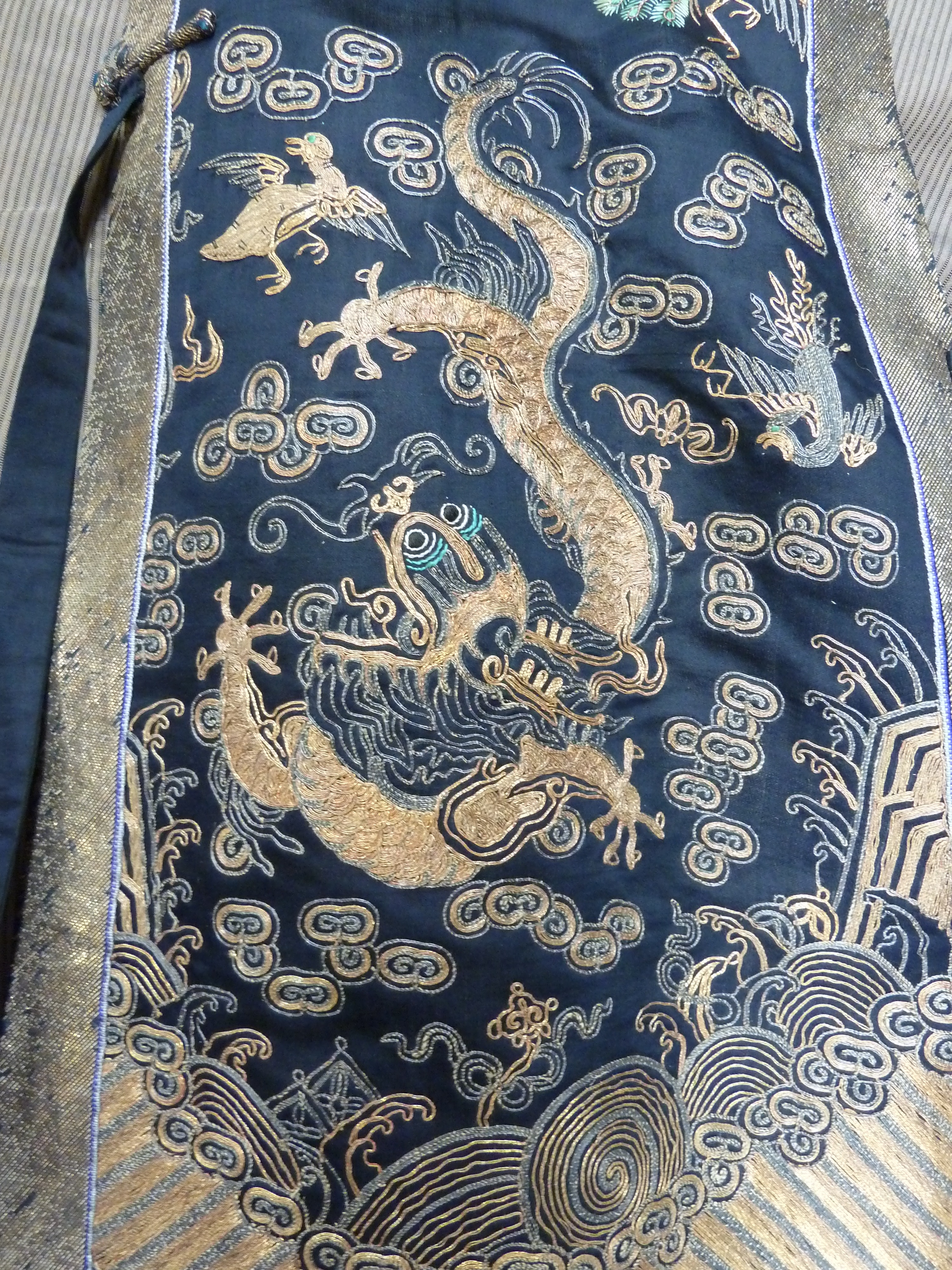 A Chinese blue black silk Xiapei vest (worn for formal occasions by ...