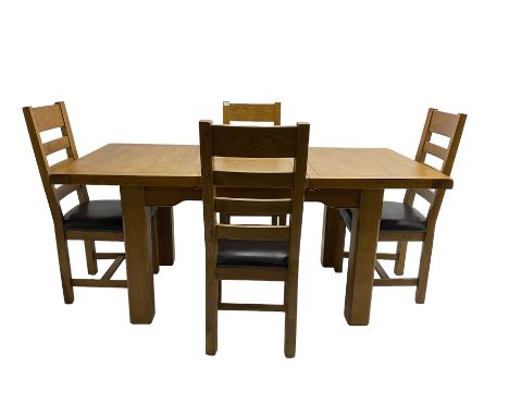Solid light oak extending dining table, rectangular top with shaped apron, raised on square chamfered supports (W130cm D90cm 