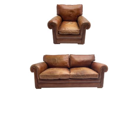 Large two seat sofa upholstered in tan 'Derwent' leather (W200cm D100cm H85cm), and matching armchair (W95cm)