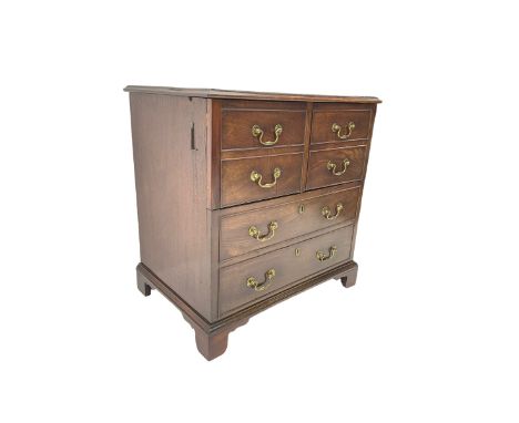 George III mahogany commode chest, hinged top and front, disguised with false drawers, on bracket feetDimensions: Height:&nbs