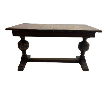 19th century oak extending dining table, rectangular top raised on gadroon carved baluster end supports united by stretcher, 