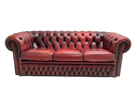 Three seat Chesterfield sofa, upholstered in deeply buttoned red leatherDimensions: Length/Width:&nbsp;193cm&nbsp;