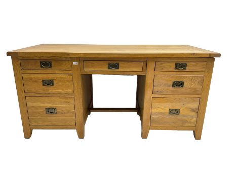 Light oak twin pedestal desk, fitted with seven drawersDimensions: Height:&nbsp;85cm&nbsp; Length/Width:&nbsp;180cm&nbsp; Dep