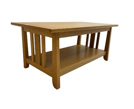 Light oak coffee table, rectangular top with under-tier and slatted sidesDimensions: Height:&nbsp;50cm&nbsp; Length/Width:&nb