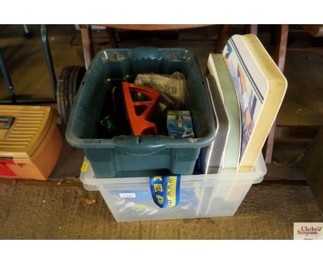 A box containing various hand tools, a Wimbledon seat cushion etc