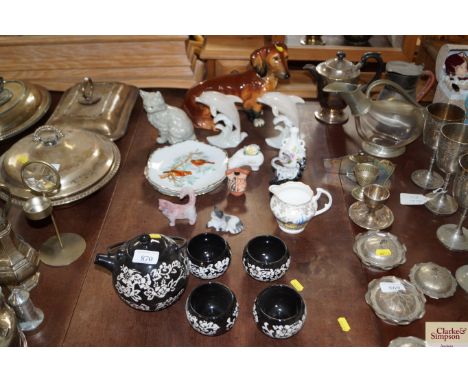 A quantity of animal ornaments; teapot and cups; jug etc