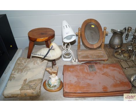 A leather satchel; shaving mirror; three legged stool; reading lamp; bird ornament and a Beswick ornament of Mr Jeremy Fisher