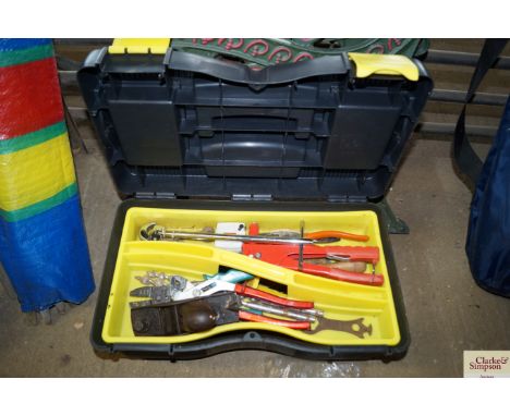 A plastic tool box and contents of various hand tools
