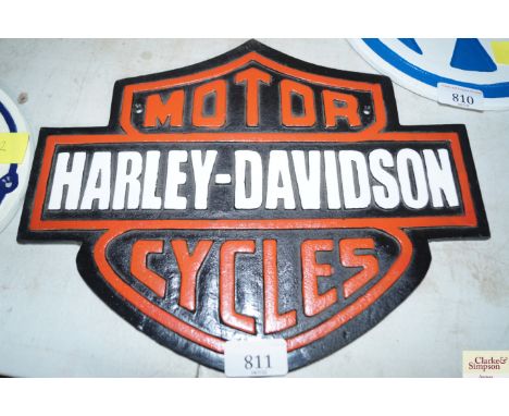 A reproduction Harley Davidson motorcycle plaque