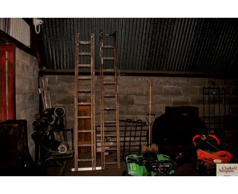 A wooden extending ladder