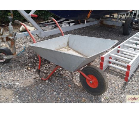A light weight galvanised wheel barrow