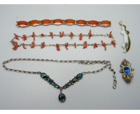 A silver and guilloche enamel bracelet, a coral necklace, one other necklace, etc. 