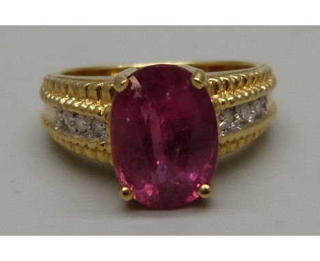 An 18ct gold, diamond and ruby ring, 7.6g, N 