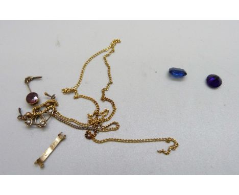 An oblong cut blue sapphire gemstone, a circular cut amethyst gemstone and a 9ct gold, garnet and pearl set Edward VII pendan