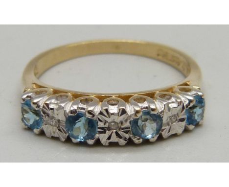 A 9ct gold, blue topaz and diamond ring, 2.7g, P 