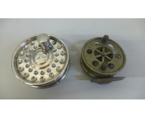 A vintage 'The Bijou' fishing reel and a fisherman's hip flask in the form of a reel 