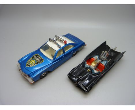 A vintage Corgi Toys National Periodical Publications Inc. Batmobile, 1970s and a Corgi Buick Regal Police car, both playworn