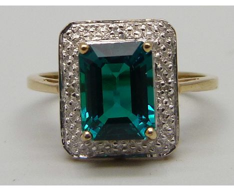 A 9ct gold Art Deco style diamond and green stone ring, stone size 9.09mm x 6.89mm, 2.9g, R 