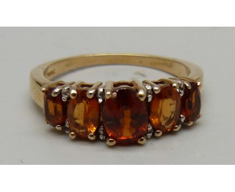 A silver gilt Spressarite garnet and Madeira citrine ring, S 