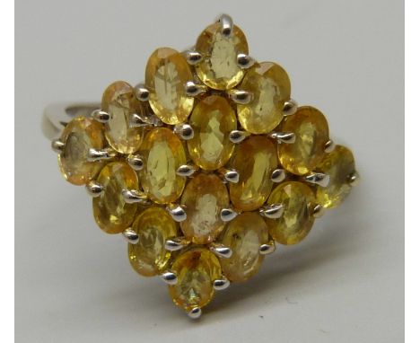 A silver gilt yellow stone cluster ring, R 