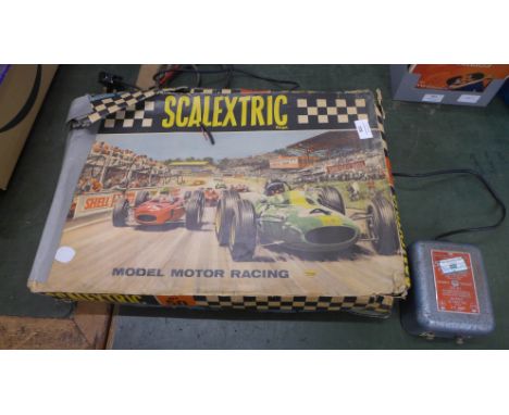 A Scalextric game, set 50 and power unit 