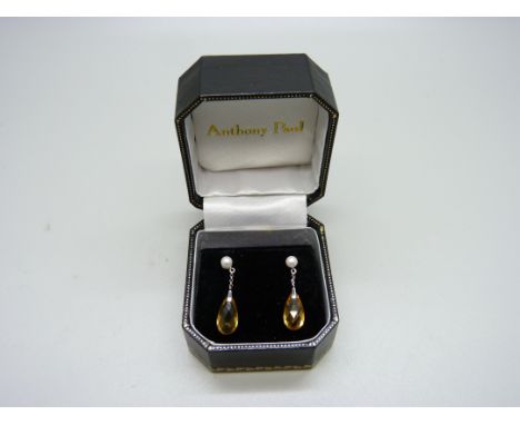 A pair of 9ct white gold, pearl and smoky quartz earrings 