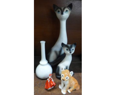 Two Sylvac long neck cats, large and small, a USSR lion cub, a Royal Doulton figure, boxed and a Royal Worcester vase 