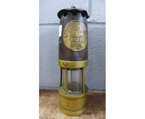 A brass and metal miner's lamp, Hailwoods Improved Lamp, Type 01 
