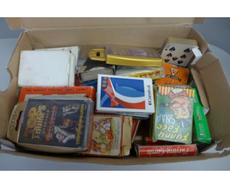A collection of playing cards including Top Trumps 