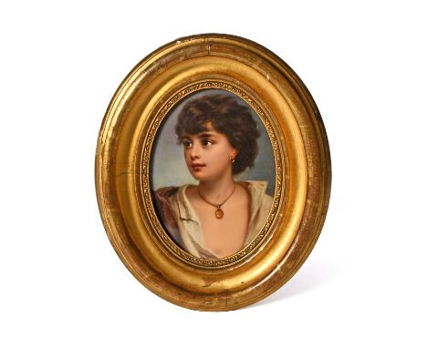 A KPM (Berlin) oval plaque, 19th century, painted with the portrait of a Neapolitan fisher boy after Gustav Karl Ludwig Richt