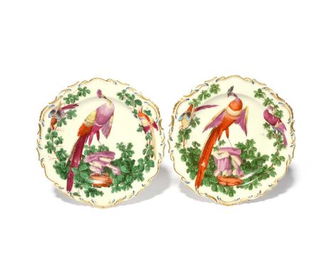 A pair of Chelsea dessert plates, c.1760-65, boldly painted in the manner of James Giles with long-tailed fancy birds perched