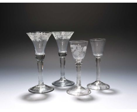 A pair of wine glasses, c.1750-60, the bell bowls engraved with a continuous band of fruiting grapevine, a small wine glass w