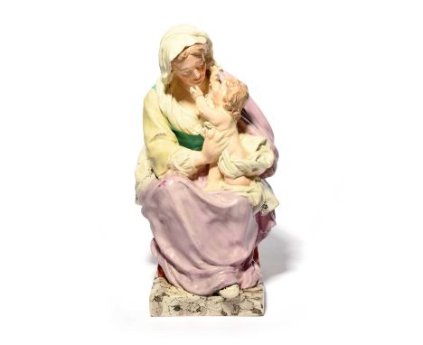 A large Wood &amp; Caldwell Staffordshire pearlware model of the Virgin and Child, c.1800, after the late 17th century model 