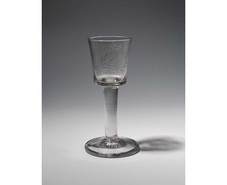 An Irish Williamite glass, c.1750-60, the bucket bowl engraved to one side with a profile portrait of King William beneath th