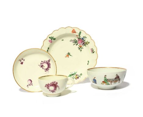 A small Worcester bowl, c.1765-70, printed and coloured with Chinese figures at various pursuits, a Worcester plate painted w