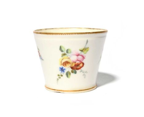 An early Sèvres sugar bowl (pot à sucre), c.1756-7, the flared bucket form painted with small sprays of European flowers on a