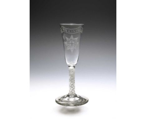 A rare military ale glass, c.1760, the slender funnel bowl engraved with the star insignia for the Order of the Garter beneat