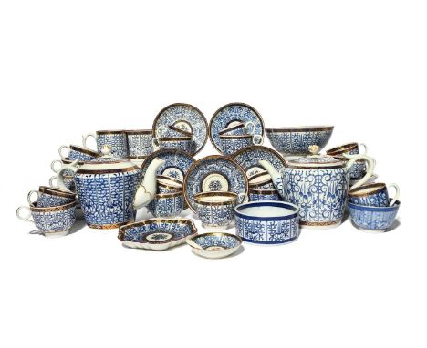 A combined Worcester tea service, c.1790-1815, decorated in the Royal Lily pattern with stylized lotus panels between blue an